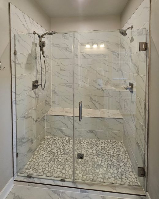 Modern designs with easy entry, non-slip floors, and custom glass doors (704-555-0199)