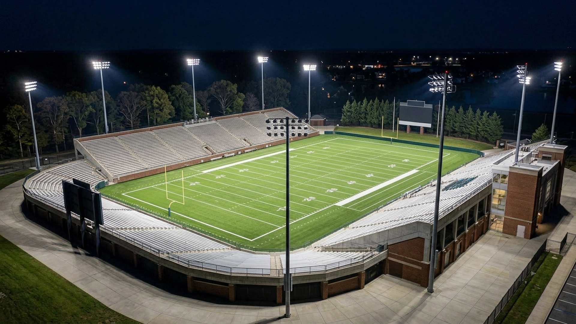 LED football stadium lighting illuminating a field at night in Long Island New York
